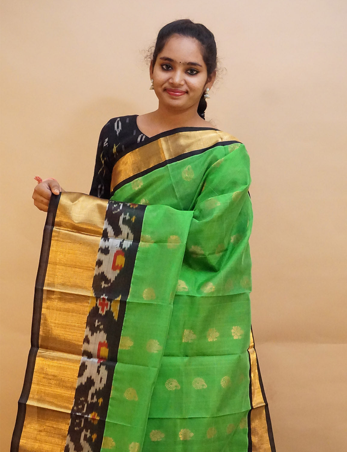 Exquisite collection of authentic green silk sarees by Gayathri Sarees, blending heritage with modern elegance.