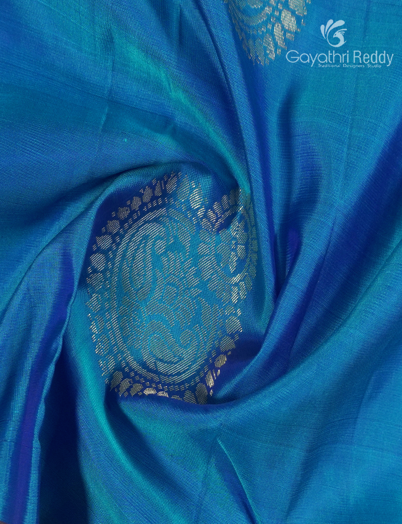 Pure Kanchipuram Temple wear in Peacock blue and Deep Purple