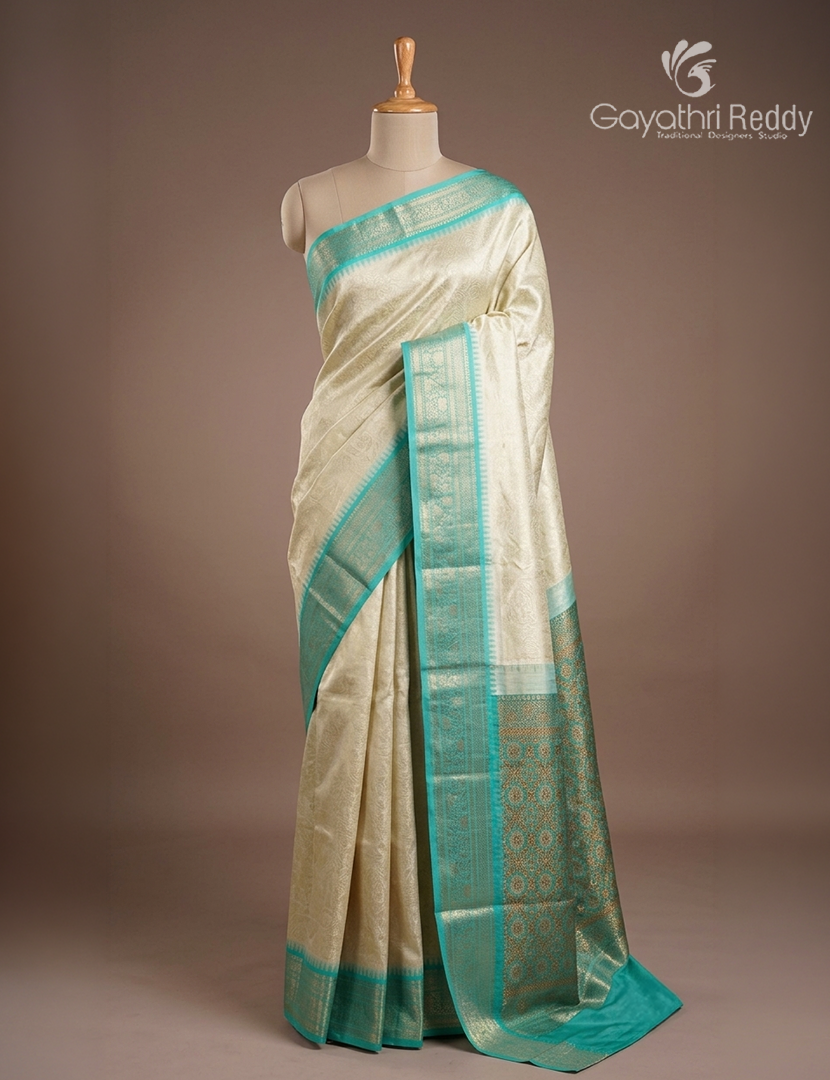 Semi Tissue Gadwal Saree in Cream and Sea Blue
