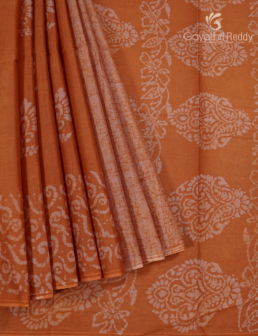 Cotton Batik Print Saree in Rust and Peach