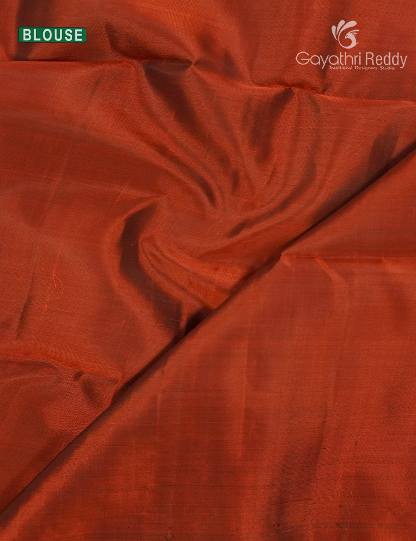 Pure Kanchipuram Soft Silk Saree in Bottle Green and Rust Orange