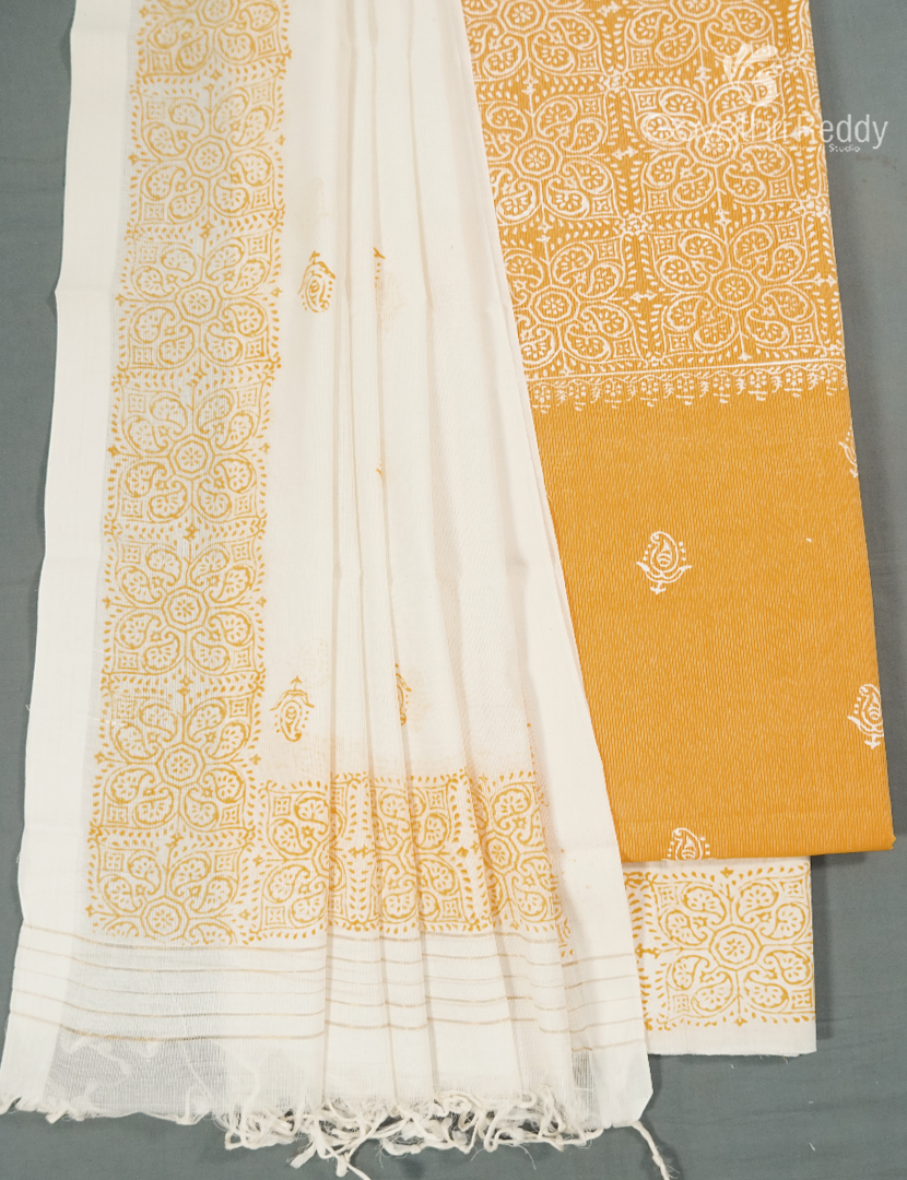 Cotton Dress Material Printed in Light Orange and Cream