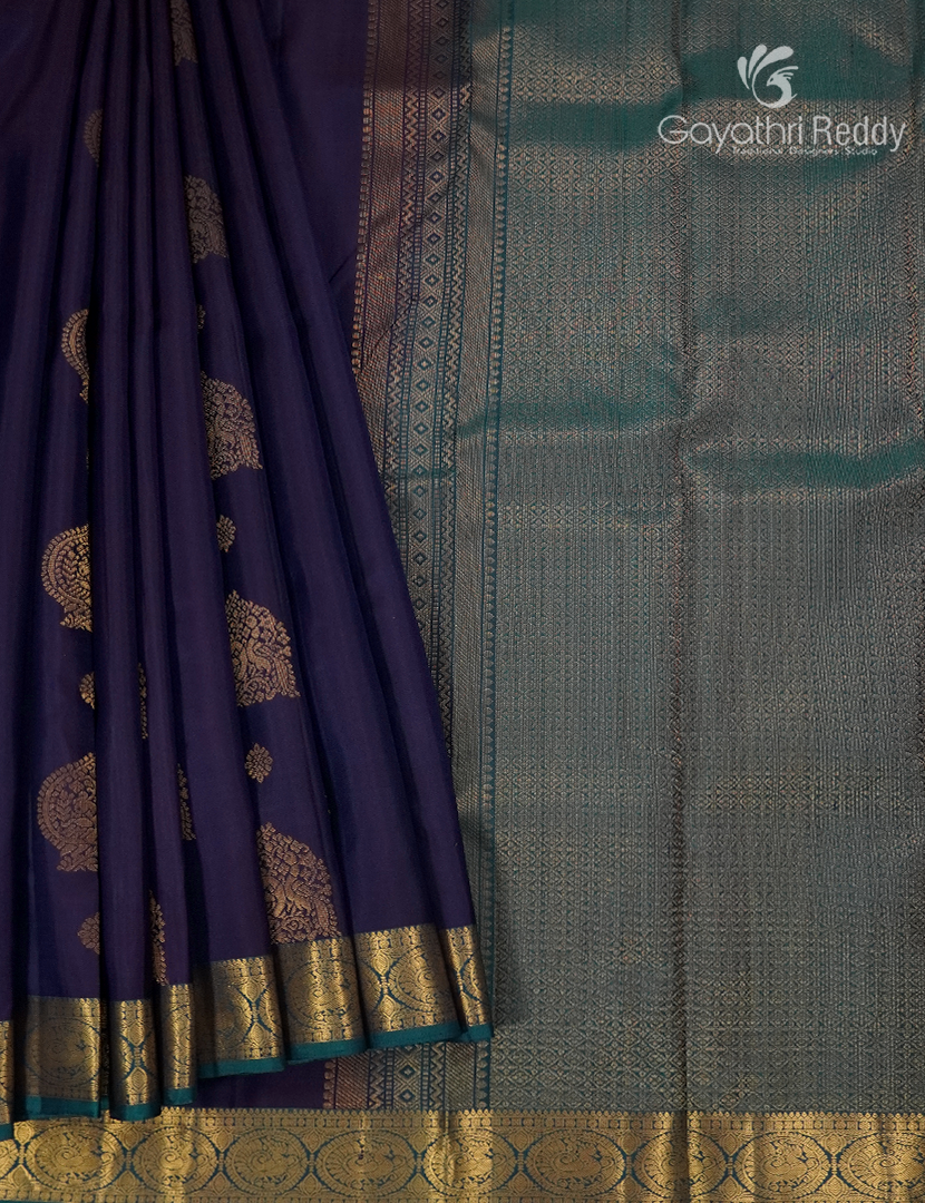 Pure Kanchipuram Silk Saree in Deep Violet and Deep Peacock Green
