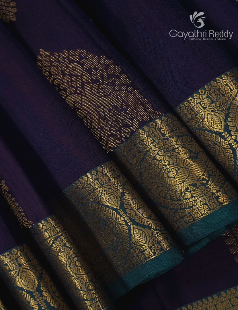 Pure Kanchipuram Silk Saree in Deep Violet and Deep Peacock Green