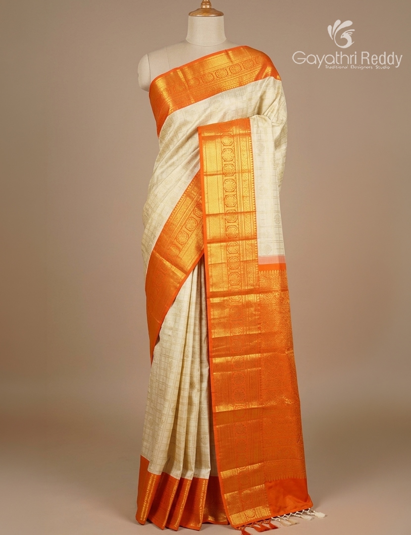 Pure Kanchipuram Silk Saree in Golden Cream and Orange ( Butta Pattern )