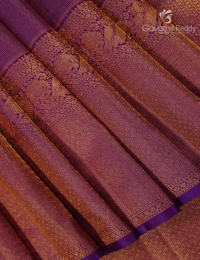 Pure Kanchipuram Silk Saree in Purple ( Butta Pattern )
