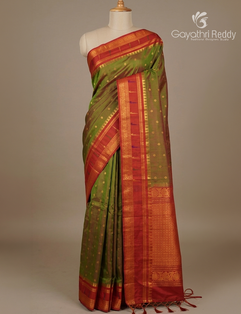 Pure Gadwal Silk Saree in Mehendi Green and Magenta