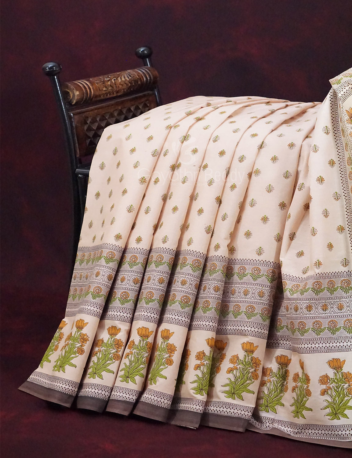 Handwoven mulmul cotton saree with delicate texture and elegant design.