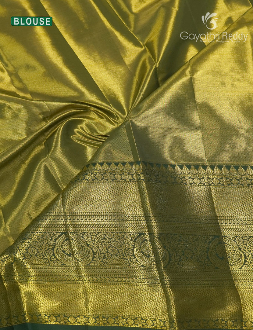 Pure  Kanchipuram Silk Saree in Butter Yellow and Bottle Green ( Brocade Pattern )