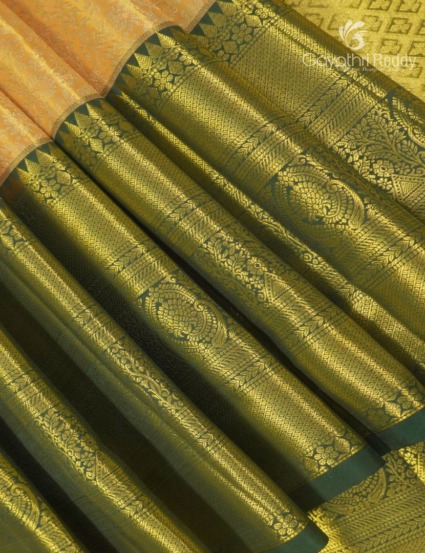 Pure  Kanchipuram Silk Saree in Butter Yellow and Bottle Green ( Brocade Pattern )