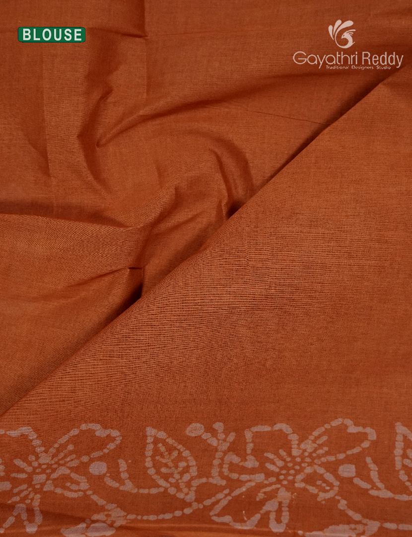 Cotton Batik Print Saree in Rust and Peach