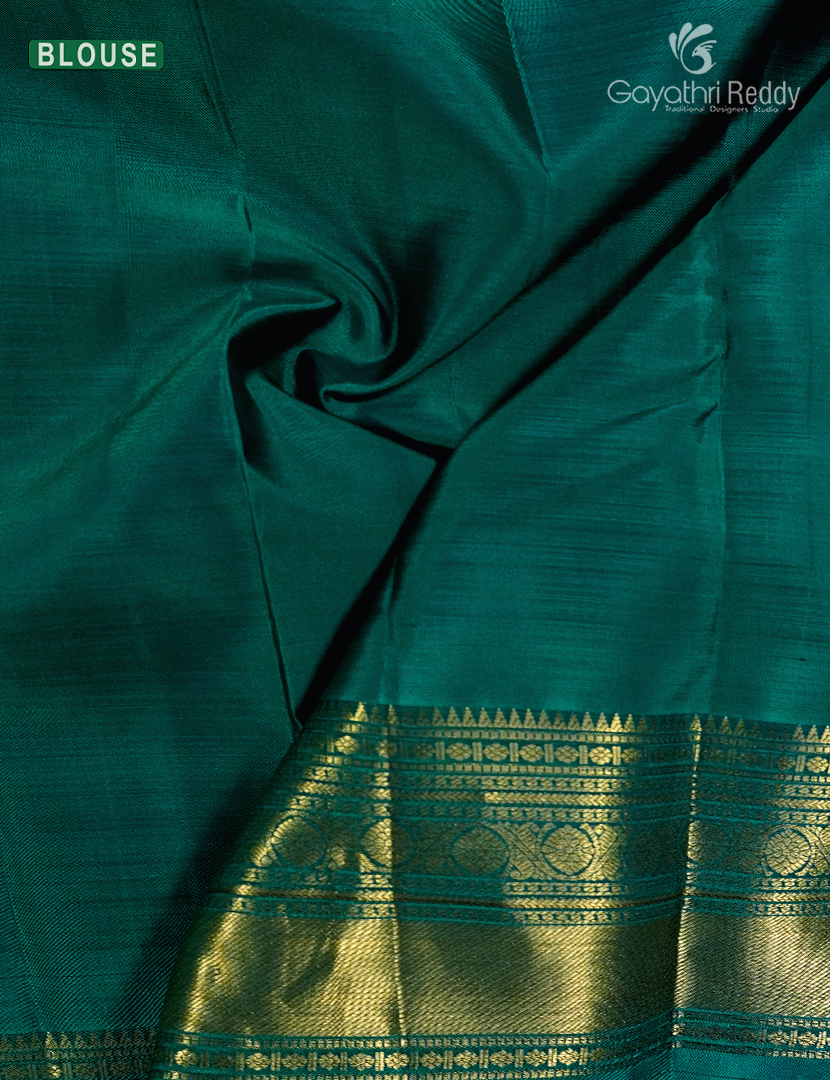 Pure Kanchipuram Silk Saree in Deep Rust and Deep Peacock Green
