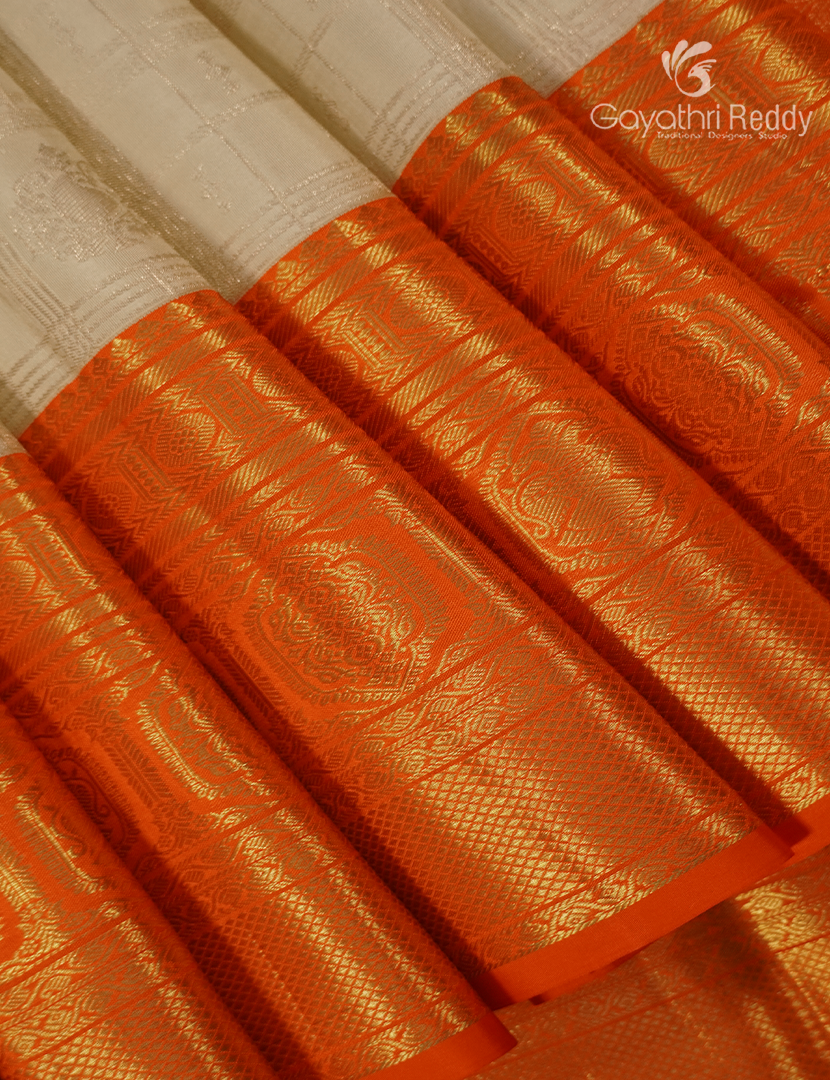 Pure  Kanchipuram Silk Saree in Golden Cream and Orange ( Butta Pattern )