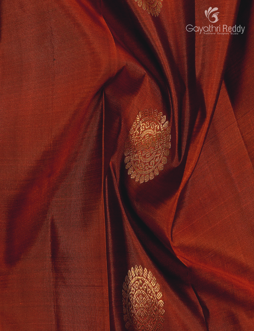 Pure Kanchipuram Silk Saree in Deep Rust and Deep Peacock Green