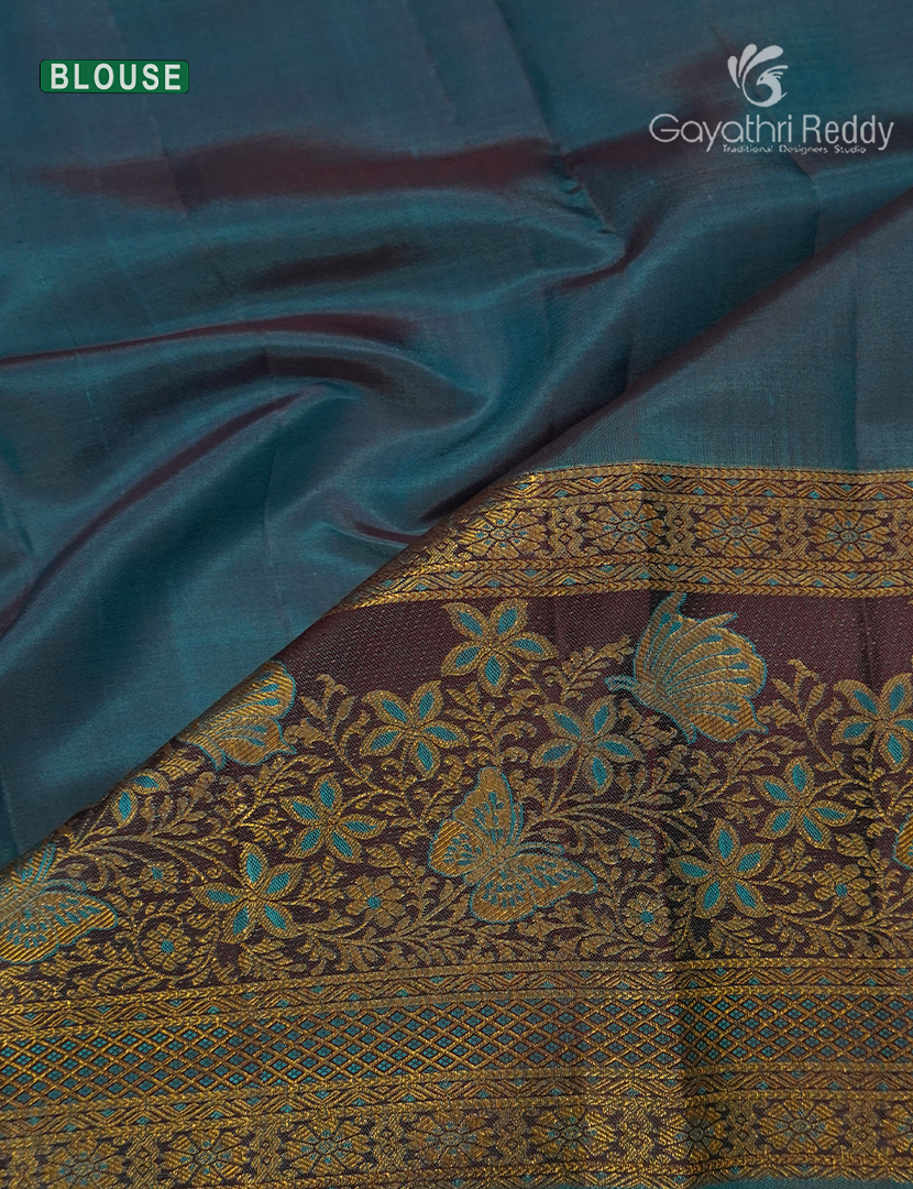Pure  Kanchipuram Silk Saree in Blue and Peacock Blue ( Butta Pattern )