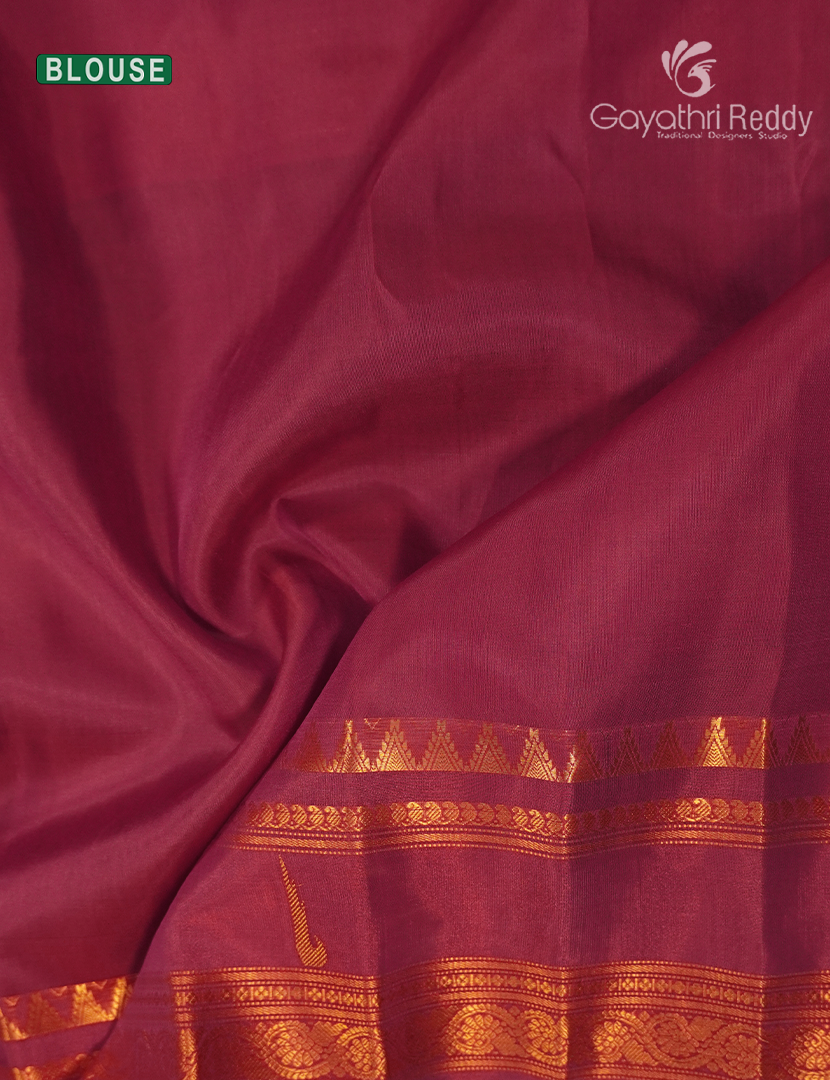 Pure Gadwal Silk Saree in Mehendi Green and Magenta