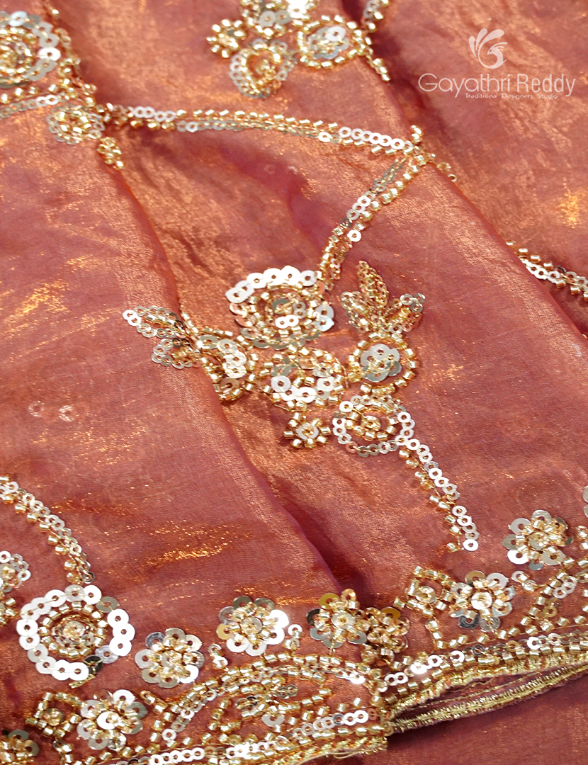 Tissue Fancy Saree in Pastel Coral