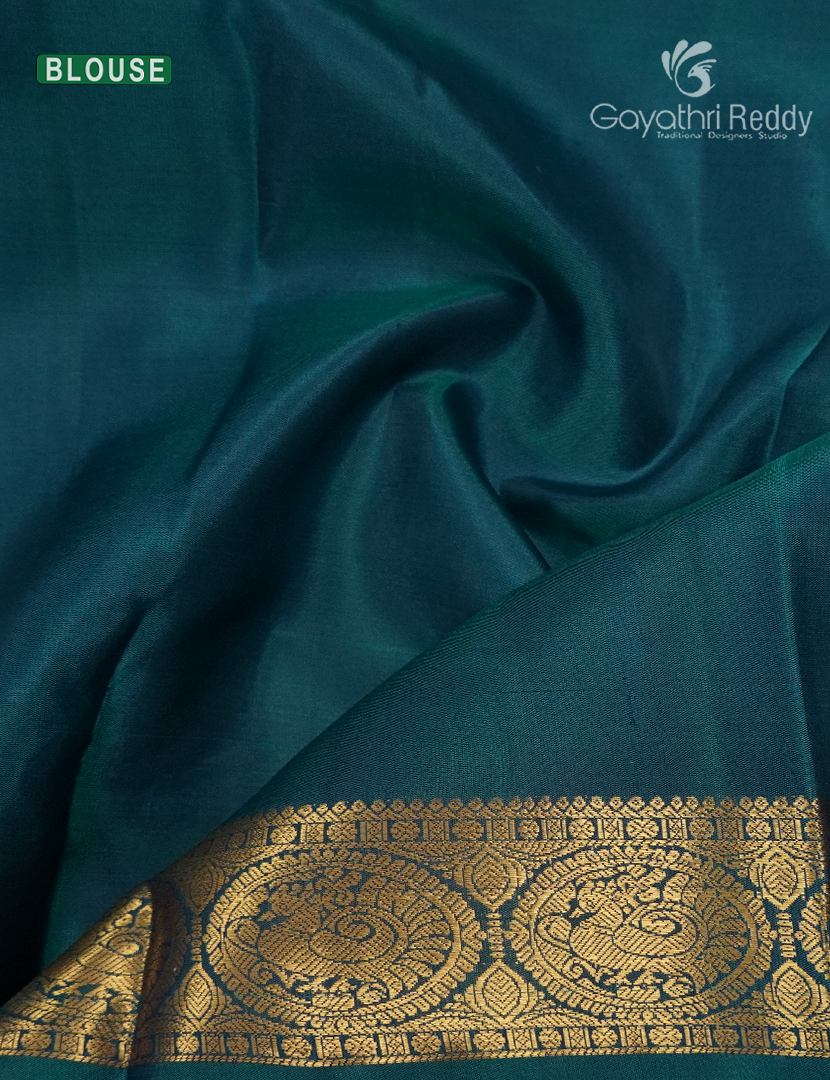 Pure Kanchipuram Silk Saree in Deep Violet and Deep Peacock Green