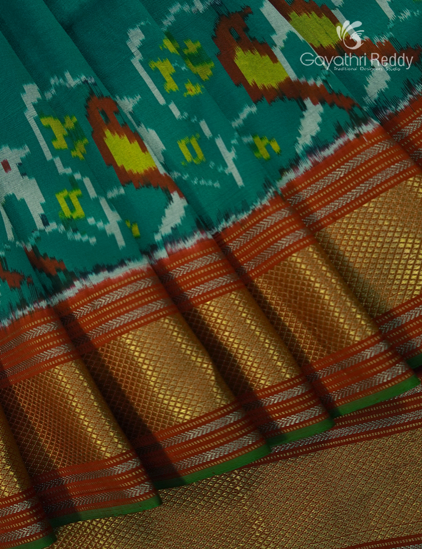 Pure Ikat Silk Saree in Rama Green and Brick Red