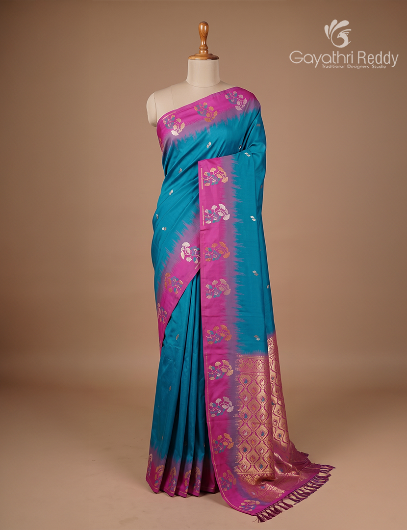 Semi Kanchipuran Silk Saree in Deep Peacock blue and  Magenta Pink
