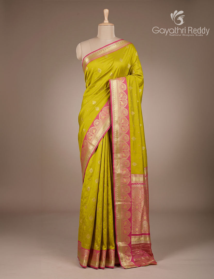 Semi Kanchipuram Silk Fancy Saree in Dry Mehendi Green and Deep Rani Pink