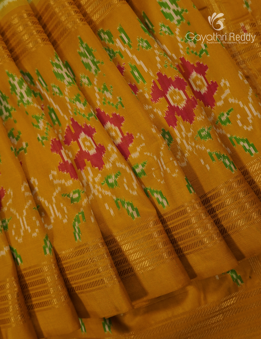Pure Ikat Silk Saree in Sea Green and Mustard