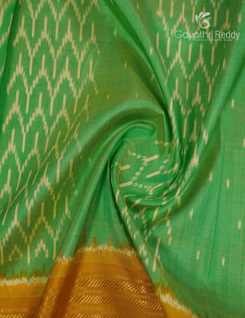 Pure Ikat Silk Saree in Sea Green and Mustard