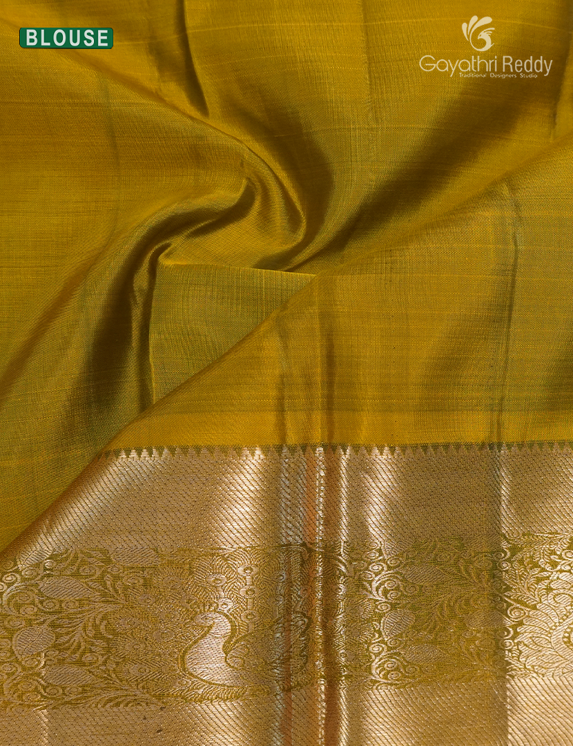 Pure Kanchipuram Silk Saree in Deep Green and Mustard