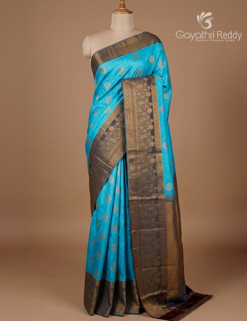 Pure  Kanchipuram Silk Saree in Blue and Peacock Blue ( Butta Pattern )