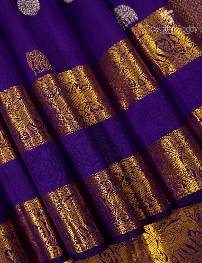Pure  Kanchipuram Silk Saree in Purple ( Butta Pattern )