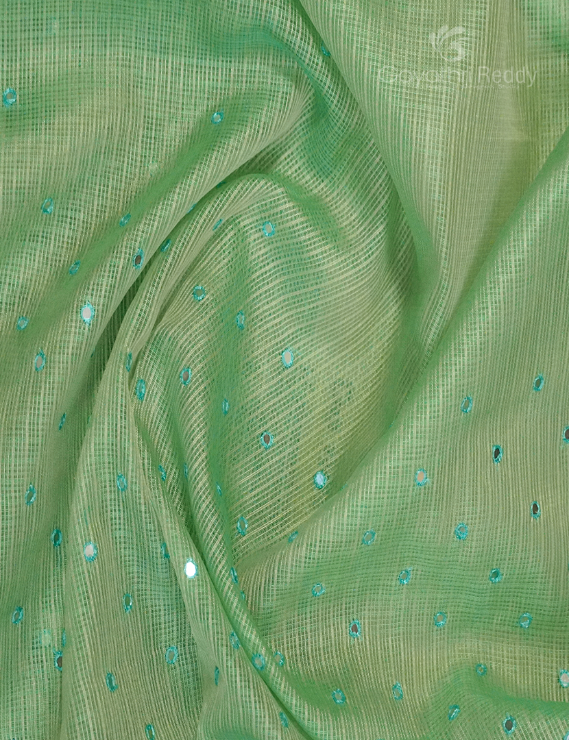 Detailed view of the intricate zari craftsmanship on a mint green Banaras Kota saree from Gayathri Sarees.