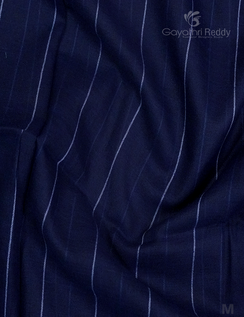 Subtle textured details on Gayathri Reddy’s premium navy blue Taani Baani linen saree.