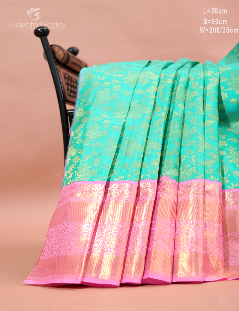 Mint green Kanchi Pattu lehenga by Gayathri Reddy, perfect for wedding and party wear, crafted from pure pattu fabric.