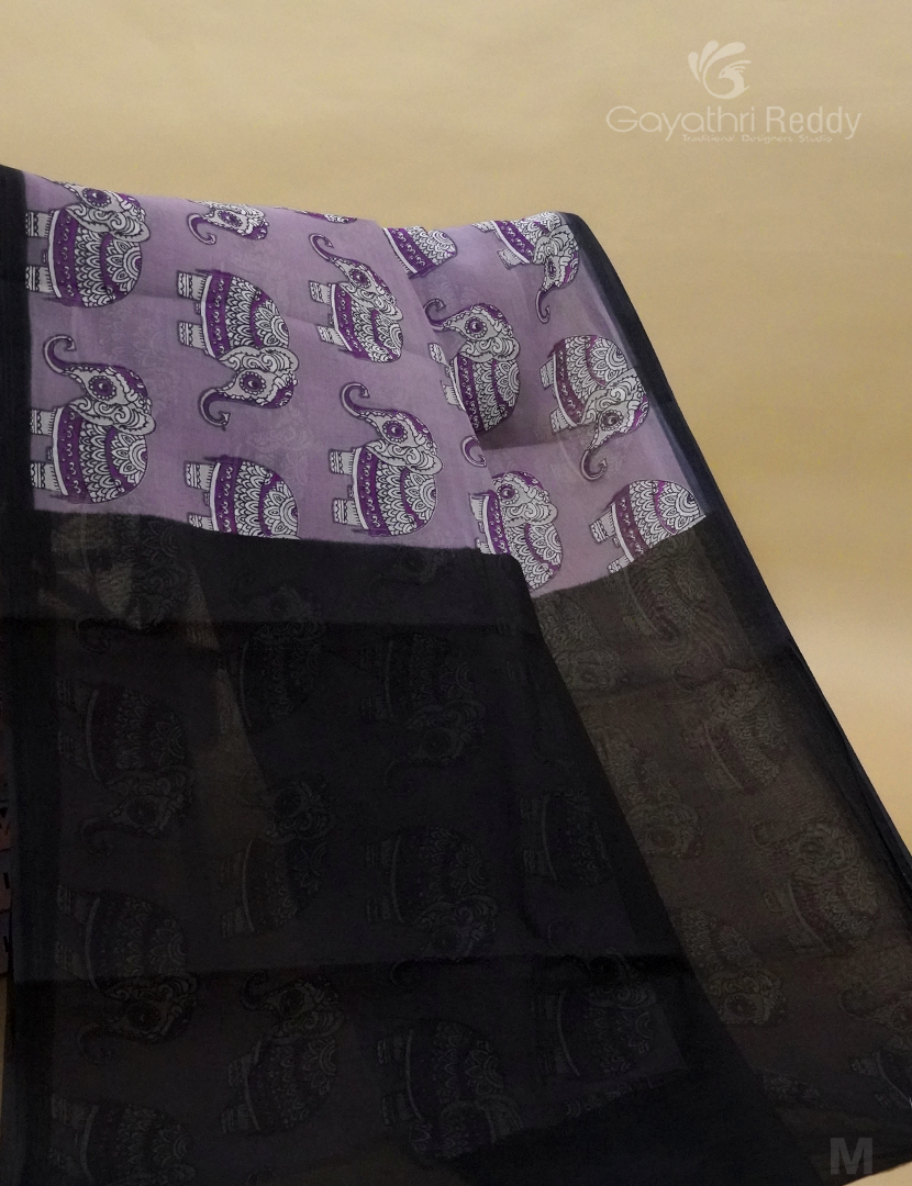 Detailed view of mirror work on a Gayathri Reddy mulmul cotton sarees.