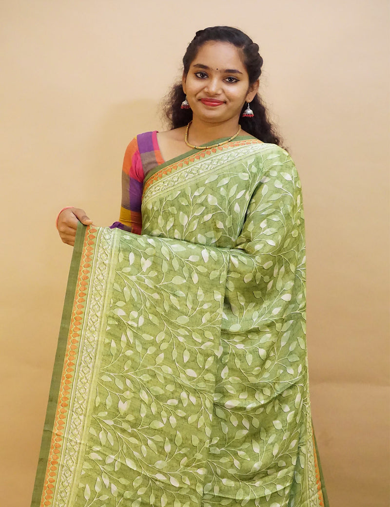 Mehendi Green silk cotton saree with contrast golden zari lines all over  saree.